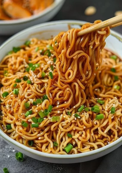 Bowl of easy saucy ramen noodles with a thick flavorful sauce