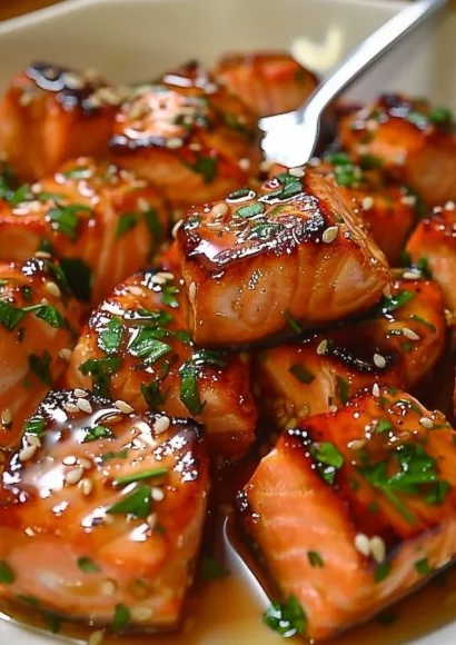 Honey butter garlic glazed salmon bites on a plate