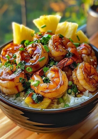 Pineapple teriyaki shrimp rice bowl with vibrant vegetables and rice