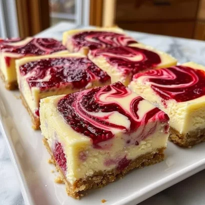 Delicious Valentine's Day cheesecake bars decorated with heart-shaped toppings